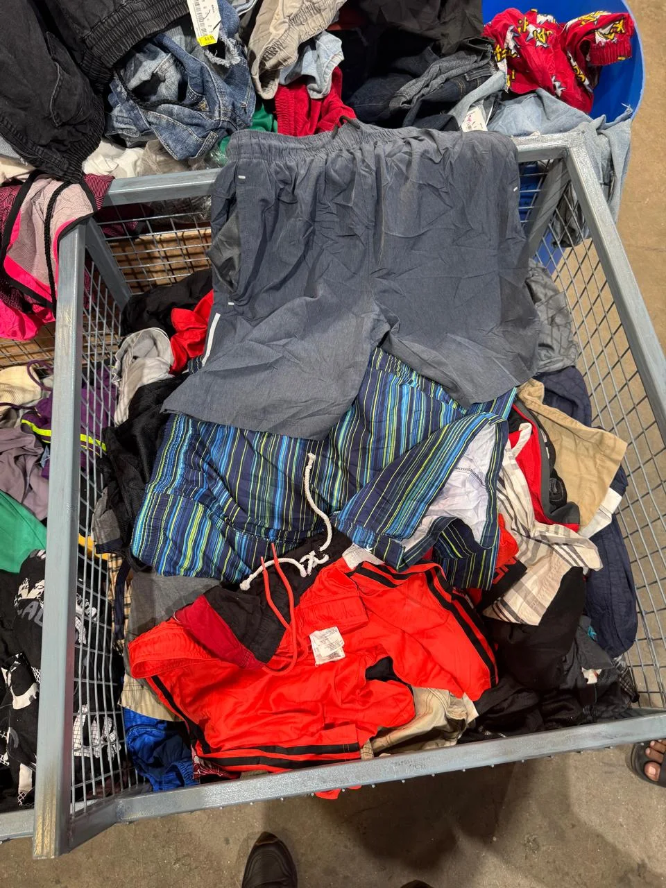 Lightweight shorts and clothing in a sorting trolley